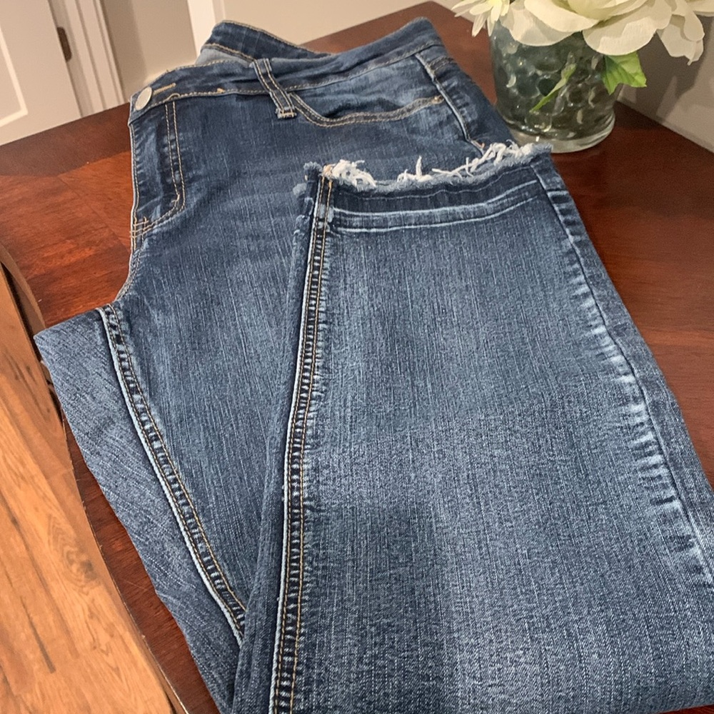 Crown & Ivy jeans with frayed bottoms